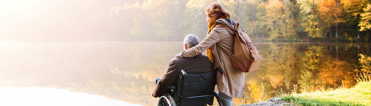 Senior Couple on Lake After Viatical Settlements